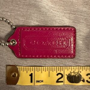 Coach Fuchsia Leather hang tag